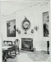 An illustration from House & garden's book of interiors, containing over three hundred illustrations of living rooms, dining rooms, libraries, halls, bedrooms, porches, breakfast rooms, nurseries, kitchens, bathrooms and the use of decorative accessories and curtains, together with practical suggestions for the furnishing and decorating of each type of room in the house (1920)