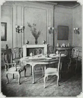 An illustration from House & garden's book of interiors, containing over three hundred illustrations of living rooms, dining rooms, libraries, halls, bedrooms, porches, breakfast rooms, nurseries, kitchens, bathrooms and the use of decorative accessories and curtains, together with practical suggestions for the furnishing and decorating of each type of room in the house (1920)