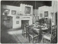 An illustration from House & garden's book of interiors, containing over three hundred illustrations of living rooms, dining rooms, libraries, halls, bedrooms, porches, breakfast rooms, nurseries, kitchens, bathrooms and the use of decorative accessories and curtains, together with practical suggestions for the furnishing and decorating of each type of room in the house (1920)