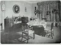 An illustration from House & garden's book of interiors, containing over three hundred illustrations of living rooms, dining rooms, libraries, halls, bedrooms, porches, breakfast rooms, nurseries, kitchens, bathrooms and the use of decorative accessories and curtains, together with practical suggestions for the furnishing and decorating of each type of room in the house (1920)