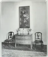 An illustration from House & garden's book of interiors, containing over three hundred illustrations of living rooms, dining rooms, libraries, halls, bedrooms, porches, breakfast rooms, nurseries, kitchens, bathrooms and the use of decorative accessories and curtains, together with practical suggestions for the furnishing and decorating of each type of room in the house (1920)