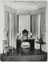 An illustration from House & garden's book of interiors, containing over three hundred illustrations of living rooms, dining rooms, libraries, halls, bedrooms, porches, breakfast rooms, nurseries, kitchens, bathrooms and the use of decorative accessories and curtains, together with practical suggestions for the furnishing and decorating of each type of room in the house (1920)