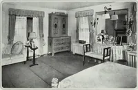 An illustration from House & garden's book of interiors, containing over three hundred illustrations of living rooms, dining rooms, libraries, halls, bedrooms, porches, breakfast rooms, nurseries, kitchens, bathrooms and the use of decorative accessories and curtains, together with practical suggestions for the furnishing and decorating of each type of room in the house (1920)