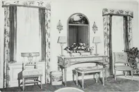 An illustration from House & garden's book of interiors, containing over three hundred illustrations of living rooms, dining rooms, libraries, halls, bedrooms, porches, breakfast rooms, nurseries, kitchens, bathrooms and the use of decorative accessories and curtains, together with practical suggestions for the furnishing and decorating of each type of room in the house (1920)