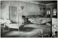 An illustration from House & garden's book of interiors, containing over three hundred illustrations of living rooms, dining rooms, libraries, halls, bedrooms, porches, breakfast rooms, nurseries, kitchens, bathrooms and the use of decorative accessories and curtains, together with practical suggestions for the furnishing and decorating of each type of room in the house (1920)