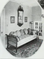 An illustration from House & garden's book of interiors, containing over three hundred illustrations of living rooms, dining rooms, libraries, halls, bedrooms, porches, breakfast rooms, nurseries, kitchens, bathrooms and the use of decorative accessories and curtains, together with practical suggestions for the furnishing and decorating of each type of room in the house (1920)