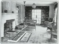 An illustration from House & garden's book of interiors, containing over three hundred illustrations of living rooms, dining rooms, libraries, halls, bedrooms, porches, breakfast rooms, nurseries, kitchens, bathrooms and the use of decorative accessories and curtains, together with practical suggestions for the furnishing and decorating of each type of room in the house (1920)