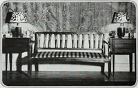 An illustration from House & garden's book of interiors, containing over three hundred illustrations of living rooms, dining rooms, libraries, halls, bedrooms, porches, breakfast rooms, nurseries, kitchens, bathrooms and the use of decorative accessories and curtains, together with practical suggestions for the furnishing and decorating of each type of room in the house (1920)