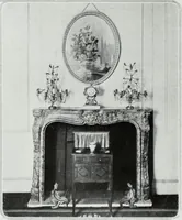 An illustration from House & garden's book of interiors, containing over three hundred illustrations of living rooms, dining rooms, libraries, halls, bedrooms, porches, breakfast rooms, nurseries, kitchens, bathrooms and the use of decorative accessories and curtains, together with practical suggestions for the furnishing and decorating of each type of room in the house (1920)