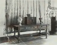 An illustration from House & garden's book of interiors, containing over three hundred illustrations of living rooms, dining rooms, libraries, halls, bedrooms, porches, breakfast rooms, nurseries, kitchens, bathrooms and the use of decorative accessories and curtains, together with practical suggestions for the furnishing and decorating of each type of room in the house (1920)