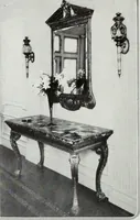An illustration from House & garden's book of interiors, containing over three hundred illustrations of living rooms, dining rooms, libraries, halls, bedrooms, porches, breakfast rooms, nurseries, kitchens, bathrooms and the use of decorative accessories and curtains, together with practical suggestions for the furnishing and decorating of each type of room in the house (1920)