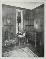 An illustration from House & garden's book of interiors, containing over three hundred illustrations of living rooms, dining rooms, libraries, halls, bedrooms, porches, breakfast rooms, nurseries, kitchens, bathrooms and the use of decorative accessories and curtains, together with practical suggestions for the furnishing and decorating of each type of room in the house (1920)
