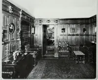 An illustration from House & garden's book of interiors, containing over three hundred illustrations of living rooms, dining rooms, libraries, halls, bedrooms, porches, breakfast rooms, nurseries, kitchens, bathrooms and the use of decorative accessories and curtains, together with practical suggestions for the furnishing and decorating of each type of room in the house (1920)