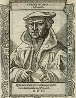 An illustration from Icones, id est, Verae imagines virorum doctrina simul et pietate illustrium, : quorum praecipuè ministerio partim bonarum literarum studia sunt restituta, partim vera religio in variis orbis Christiani regionibus, nostra patrúmque memoria fuit instaurata : additis eorundem vitae & operae descriptionibus, quibus adiectae sunt nonnullae picturae quas emblemata vocant. (1580)