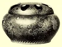 An illustration from Illustrated Catalogue of the Noteworthy Collection of Cloisonne and Other Enamels, Old Japanese Bronzes, Sword Guards, Knife Handles, Swords, Lacquers and Fine Old Brocades : belonging to Dr. Alfred Owre of Minneapolis (1917)