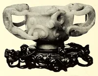 An illustration from Illustrated Catalogue of a Very Important Collection of Antique Chinese Porcelains including Fine Specimens of Sang-De-Bceuf and Peachbloom Tang and Ming Pottery, Carved Jade and Other Hard Stones, Cloisonne Enamels, a Number of Ming Large Plant Jars and Antique Chinese Rugs : collected by Messrs. Voron & Chiat of New York (1918)