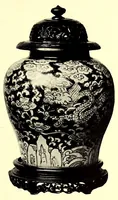An illustration from Illustrated catalogue of an important collection of antique Chinese porcelains, ancient pottery, fine jades and agates, cloisonne enamels, beautiful snuff bottles, carved rhinoceros horn, bronzes and other objects : formed by Ernest Marsh, J.P. of Haselmore, Surrey, England .. (1916)