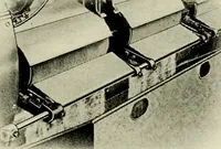 An illustration from Illustrated and descriptive catalog of Whitin cotton combing machinery : and handbook of useful information for overseers and operatives (1922)