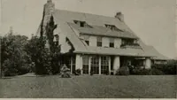 An illustration from Inexpensive homes of individuality : being a collection of photographs and floor plans illustrating certain of America's best country and suburban homes of moderate size (1911)