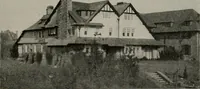 An illustration from Inexpensive homes of individuality : being a collection of photographs and floor plans illustrating certain of America's best country and suburban homes of moderate size (1911)