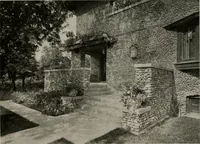 An illustration from Inexpensive homes of individuality : being a collection of photographs and floor plans illustrating certain of America's best country and suburban homes of moderate size (1911)