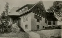 An illustration from Inexpensive homes of individuality : being a collection of photographs and floor plans illustrating certain of America's best country and suburban homes of moderate size (1911)