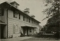 An illustration from Inexpensive homes of individuality : being a collection of photographs and floor plans illustrating certain of America's best country and suburban homes of moderate size (1911)