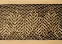 An illustration from Ingalls' hand-book of darned lace patterns .. (1885)