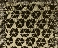 An illustration from A lace guide for makers and collectors; with a bibliography and five-language nomenclature, profusely illus. with halftone plates and key designs (1920)