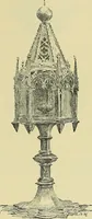 An illustration from L'arte nell'industria : lavori di legno e pastiglia, lavori di metallo, lavori di pietra, marmo, alabastro, ceramica, musaico, vetro, lavori di osso e avorio, lavori tessili, carte da parati e cuoi decorati, ricami, pizzi, cartelloni, stampe, ecc. (1907)