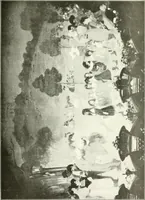 An illustration from L'art à la Taverne de Paris. Chéret, Abel Faivre, Grün, Léandre, Métivet, Steinlen, Willette, artistes peintres. Emile Robert, ferronnier d'art. Jacques Hermant, architecte. Photogravures de Ducourtioux et Huillard, d'après les clichés de Simonet (1906)