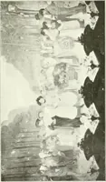 An illustration from L'art à la Taverne de Paris. Chéret, Abel Faivre, Grün, Léandre, Métivet, Steinlen, Willette, artistes peintres. Emile Robert, ferronnier d'art. Jacques Hermant, architecte. Photogravures de Ducourtioux et Huillard, d'après les clichés de Simonet (1906)