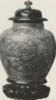 An illustration from Illustrated catalogue of the important collection of antique Chinese porcelains, Sung and Ming potteries, ancient stone sculptures, carved jades and other hard stones, snuff bottles, Mandarin necklaces, bronzes, enamels, palace furniture and wall panels and a number of rare and fine ancient Chinese paintings of the Sung and Ming periods [electronic resource] : all of which are to be sold at unrestricted public sale by direction of the Chinese expert, Lee Van Ching of Shanghai on the afternoons herein stated (1917)