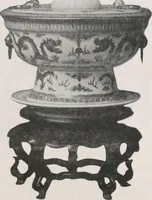 An illustration from Illustrated catalogue of the important collection of antique Chinese porcelains, Sung and Ming potteries, ancient stone sculptures, carved jades and other hard stones, snuff bottles, Mandarin necklaces, bronzes, enamels, palace furniture and wall panels and a number of rare and fine ancient Chinese paintings of the Sung and Ming periods [electronic resource] : all of which are to be sold at unrestricted public sale by direction of the Chinese expert, Lee Van Ching of Shanghai on the afternoons herein stated (1917)
