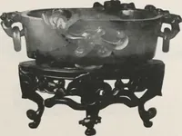 An illustration from Illustrated catalogue of the important collection of antique Chinese porcelains, Sung and Ming potteries, ancient stone sculptures, carved jades and other hard stones, snuff bottles, Mandarin necklaces, bronzes, enamels, palace furniture and wall panels and a number of rare and fine ancient Chinese paintings of the Sung and Ming periods [electronic resource] : all of which are to be sold at unrestricted public sale by direction of the Chinese expert, Lee Van Ching of Shanghai on the afternoons herein stated (1917)