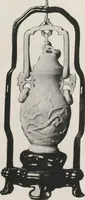 An illustration from Illustrated catalogue of the important collection of antique Chinese porcelains, Sung and Ming potteries, ancient stone sculptures, carved jades and other hard stones, snuff bottles, Mandarin necklaces, bronzes, enamels, palace furniture and wall panels and a number of rare and fine ancient Chinese paintings of the Sung and Ming periods [electronic resource] : all of which are to be sold at unrestricted public sale by direction of the Chinese expert, Lee Van Ching of Shanghai on the afternoons herein stated (1917)