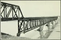 An illustration from The making of a great Canadian railway; the story of the search for and discovery of the search for and discovery of the route, and the constru ction of the nearly completed Grand trunk Pacific railway from the Atlantic to the Pacific, with some account of the hardships and stirring adventures of its constructors in unexplored country (1912)