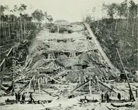 An illustration from The making of a great Canadian railway; the story of the search for and discovery of the search for and discovery of the route, and the constru ction of the nearly completed Grand trunk Pacific railway from the Atlantic to the Pacific, with some account of the hardships and stirring adventures of its constructors in unexplored country (1912)