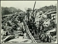 An illustration from The making of a great Canadian railway; the story of the search for and discovery of the search for and discovery of the route, and the constru ction of the nearly completed Grand trunk Pacific railway from the Atlantic to the Pacific, with some account of the hardships and stirring adventures of its constructors in unexplored country (1912)