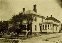 An illustration from Milestones along the color line : a souvenir of Durham, N.C., showing the progress of a race (1922)