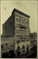 An illustration from Milestones along the color line : a souvenir of Durham, N.C., showing the progress of a race (1922)