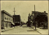 An illustration from Milestones along the color line : a souvenir of Durham, N.C., showing the progress of a race (1922)