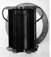An illustration from A mechanical tension testing facility for brittle materials (1967)