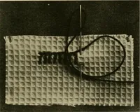 An illustration from Needlework without "specimens": the modern book of school needlework (1900)