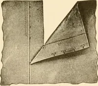 An illustration from The new dressmaker; with complete and fully illustrated instructions on every point connected with sewing, dressmaking and tailoring, from the actual stitches to the cutting, making, altering, mending, and cleaning of clothes for ladies, misses, girls, children, infants, men and boys (1921)