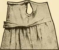An illustration from The new dressmaker; with complete and fully illustrated instructions on every point connected with sewing, dressmaking and tailoring, from the actual stitches to the cutting, making, altering, mending, and cleaning of clothes for ladies, misses, girls, children, infants, men and boys (1921)