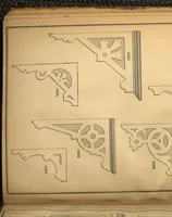 An illustration from New universal moulding book, containing latest styles of mouldings and architectural designs of exterior and interior finish ... rails, balusters and newel posts; architraves; front, interior and store doors .. (1891)