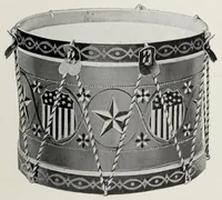 An illustration from Noble & Cooley : Manufacturers of toy drums, banjos, tambourines, zitherns, rolling hooples (1901)