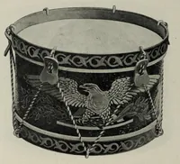 An illustration from Noble & Cooley : Manufacturers of toy drums, banjos, tambourines, zitherns, rolling hoops, sand mills, etc. (1907)