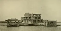 An illustration from One hundred country houses : modern American examples (1909)